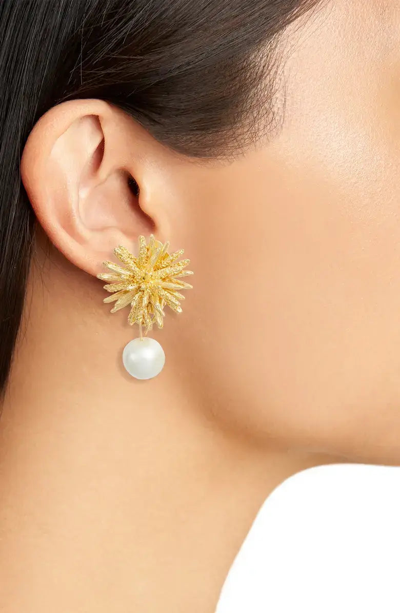 - Starburst clip on earrings with faux pearl drop: Gold