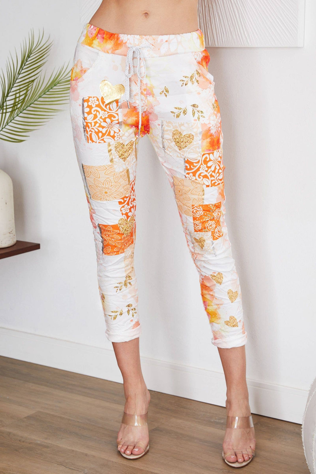 ORANGE FOIL JOGGERS: LARGE