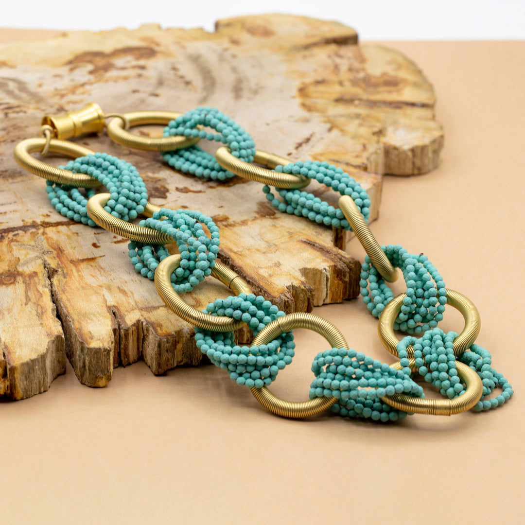 Sea Lily - 942 GLD/TURQ - gold rings with connecting turquoise hematite